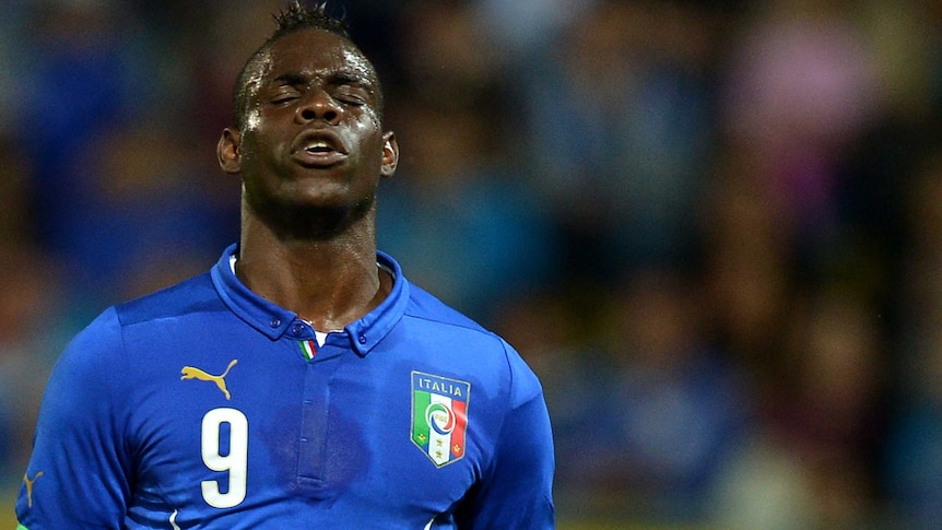 Italy striker Balotelli shows his frustration