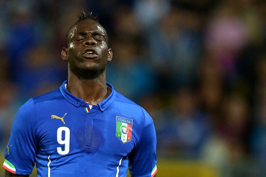 Italy striker Balotelli shows his frustration