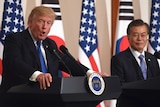Donald Trump and South Korean President Moon Jae-In speaks at a press conference in South Korea.
