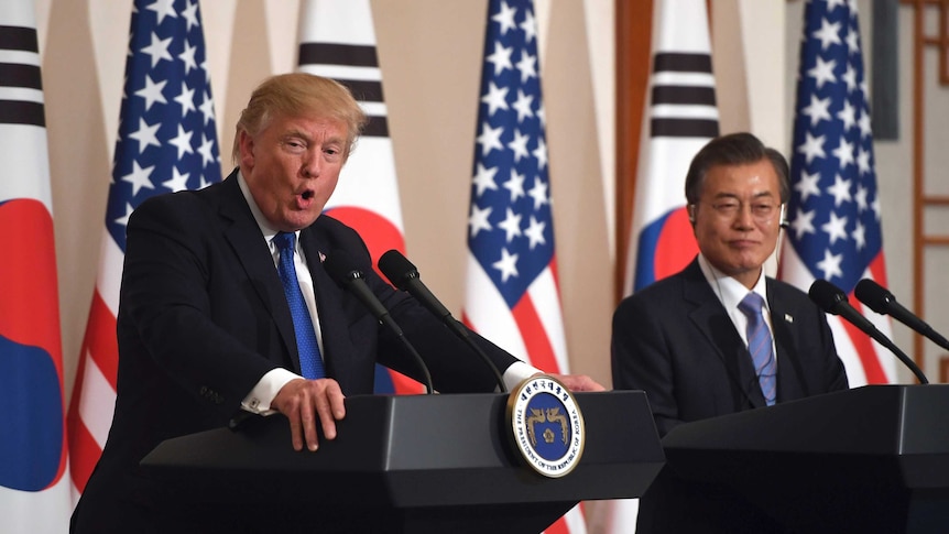 Donald Trump and South Korean President Moon Jae-In speaks at a press conference in South Korea.