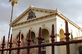 an old court building with blue sky background