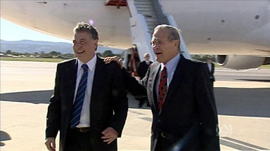 Defence Minister Robert Hill greets US Defence Secretary Donald Rumsfeld in Adelaide.