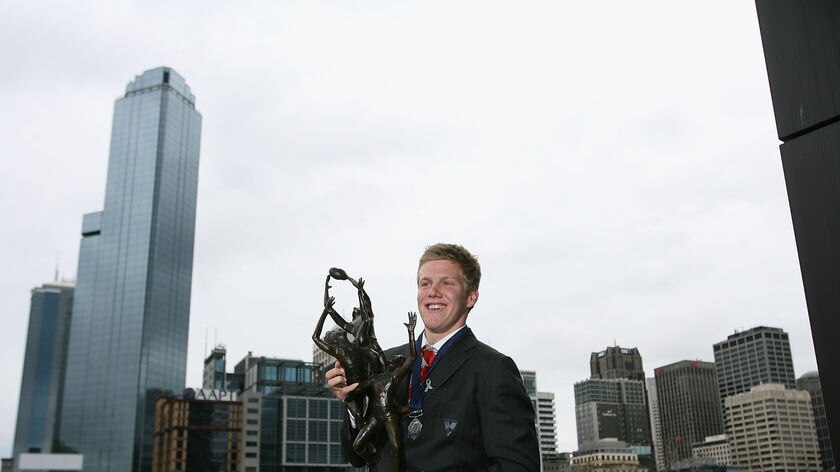 Star on the rise ... Daniel Hannebery shows off his trophy in Melbourne.