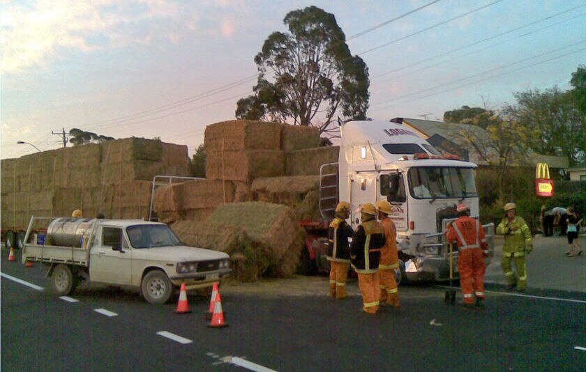 Four injured in hay truck crash - ABC News