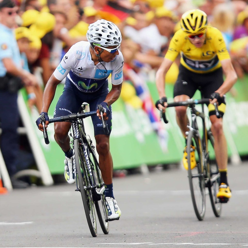 Nairo Quintana crosses the finish line on stage 17 of the Tour de France ahead of Chris Froome.