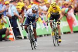 Nairo Quintana crosses the finish line on stage 17 of the Tour de France ahead of Chris Froome.