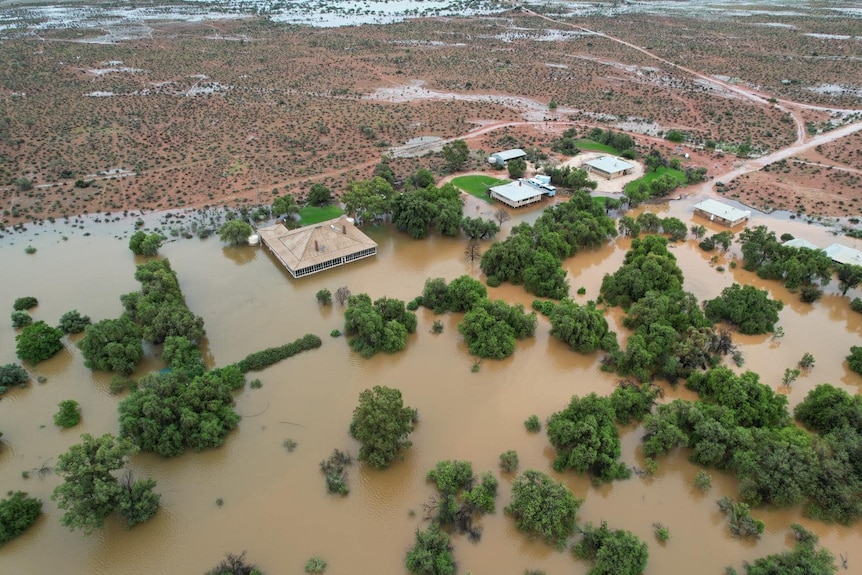 An aerial view of a remote pastoral station which has been flooded by heavy rains.  