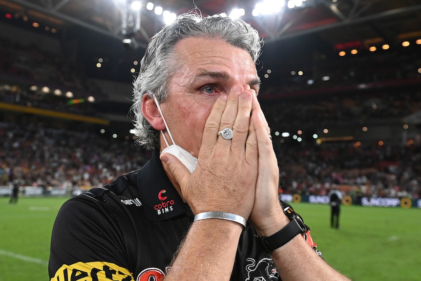 Rugby league coach with tears of joy after winning grand final