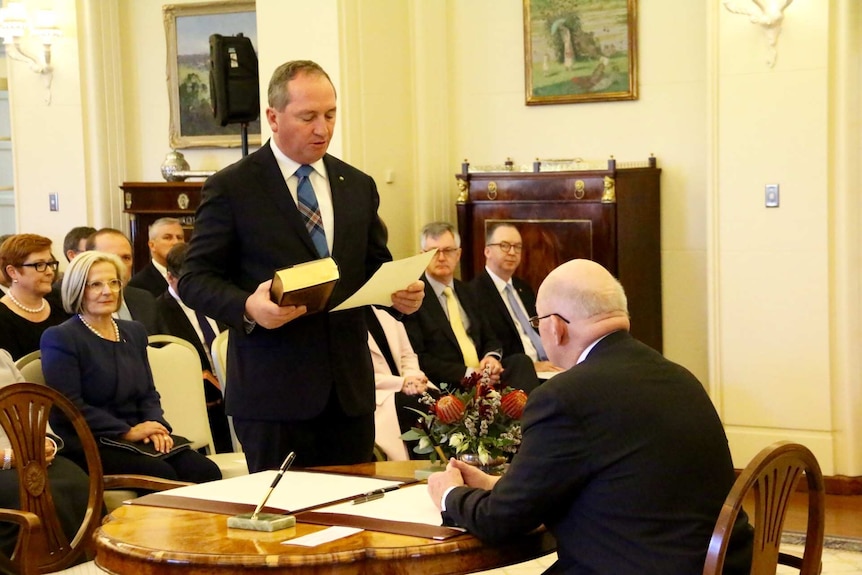 Barnaby Joyce is sworn in at Government House.