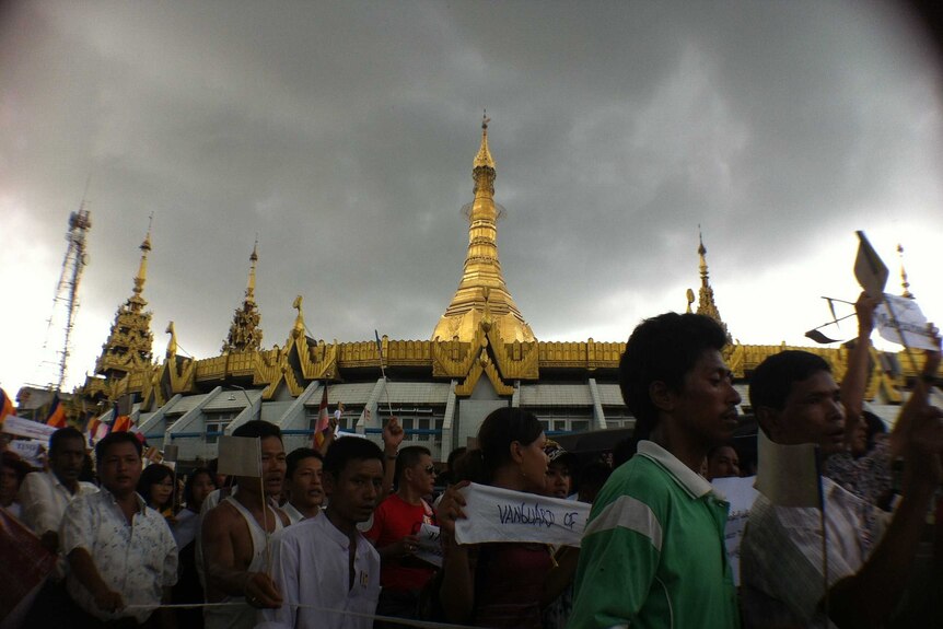 Supporters of radical Buddhist monk Wirathu walk through Yangon.
