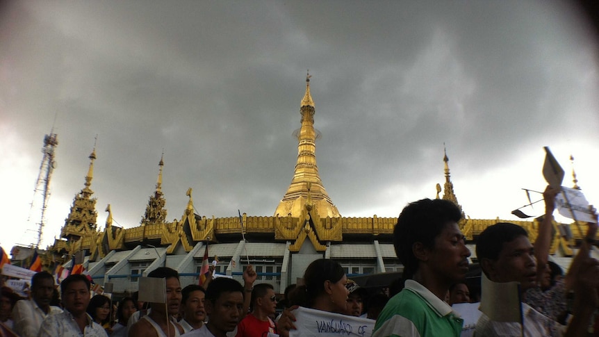 Supporters of radical Buddhist monk Wirathu walk through Yangon.