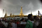 Supporters of radical Buddhist monk Wirathu walk through Yangon.