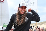 Tyler Wright celebrates her surfing world title