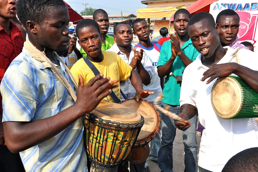 Men playing drums in Ghana.