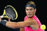 Rafael Nadal winds up a slice backhand at the Australian Open.