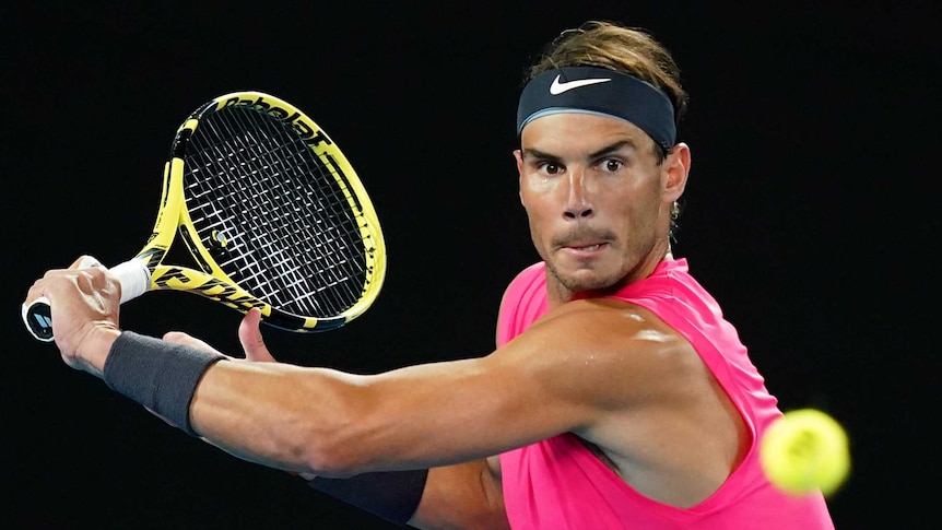 Rafael Nadal winds up a slice backhand at the Australian Open.