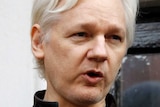 WikiLeaks founder Julian Assange gestures.