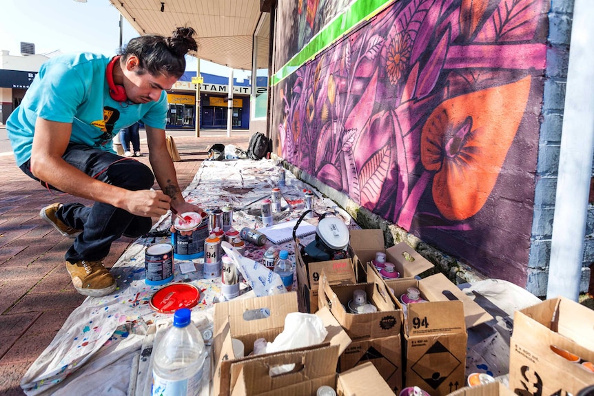 Edgar 'Saner' Flores at work on Albany Highway.