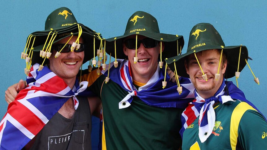 Australian supporters arrive at the Gabba