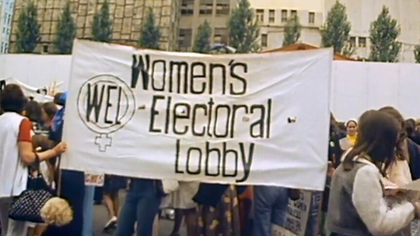 Protestors hold banner with text "Women's Electoral Lobby"