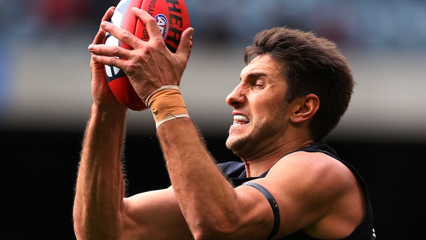 On target ... Jarrad Waite marks the ball for the Blues