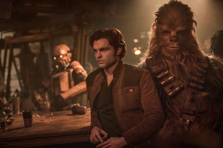 Still image of Alden Ehrenreich and Joonas Suotamo as Han Solo and Chewbacca