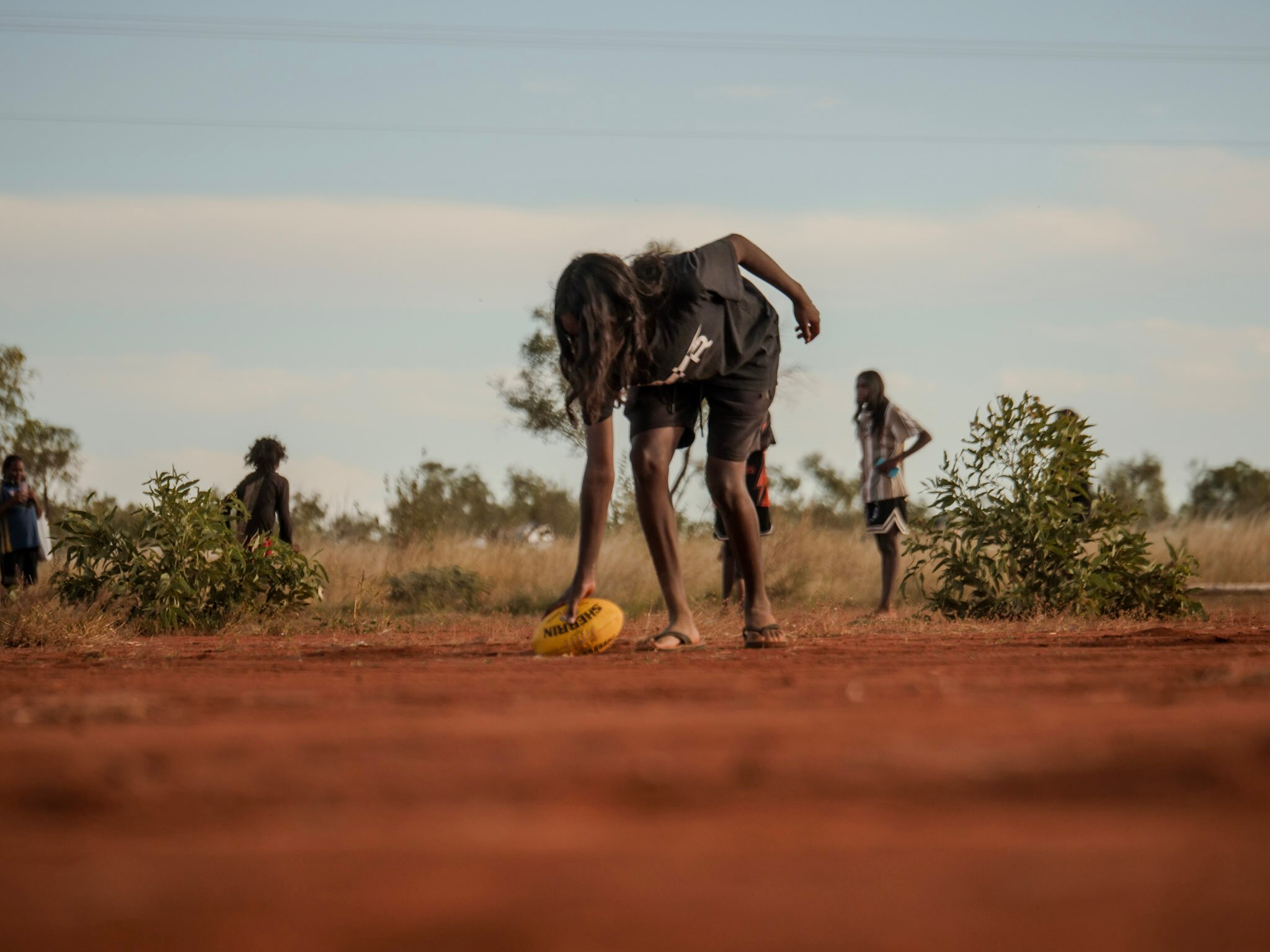 In the outback community of Alpurrurulam, footy is more religion than ...