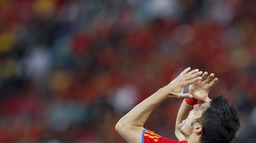 Missed chances: David Villa vents his frustration as Spain put 24 shots on target but landed no killer blow.