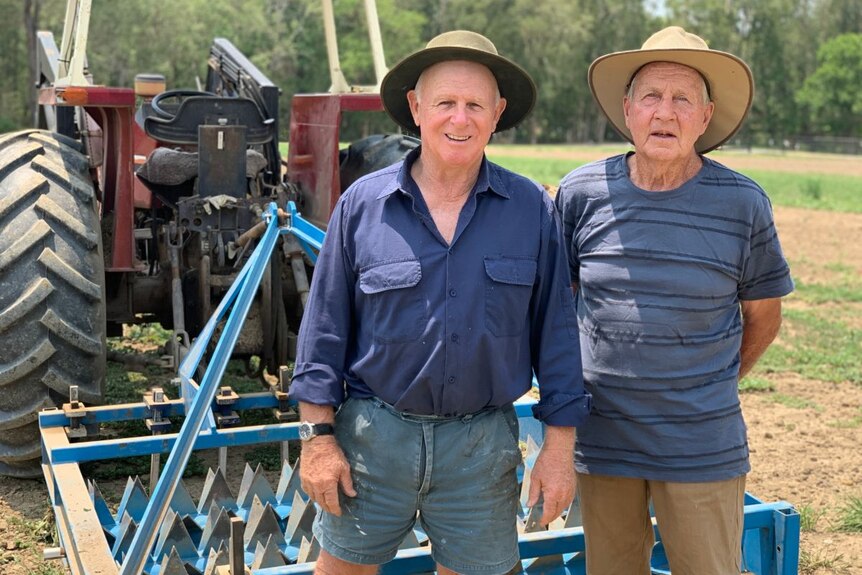 Bill Sharpe (left) and Bill Peterson stand in front of the Wiking Rollavator