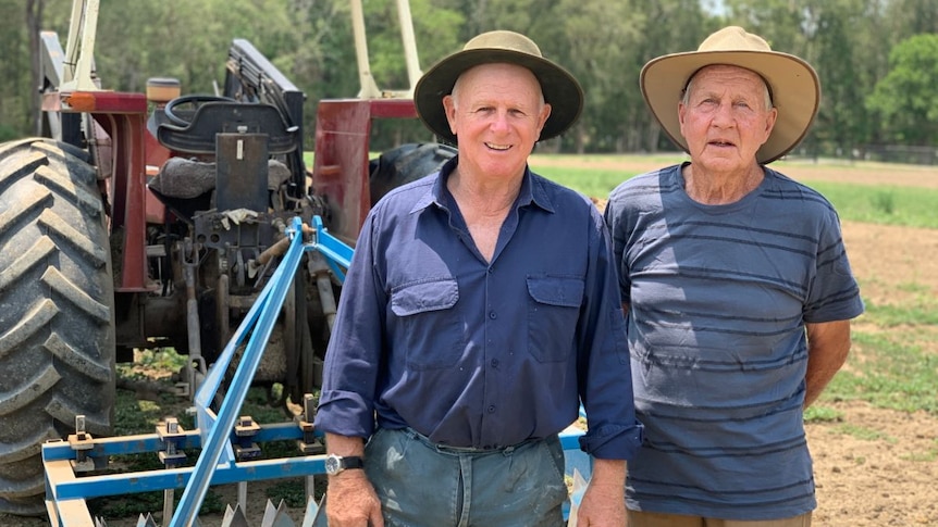 Bill Sharpe (left) and Bill Peterson stand in front of the Wiking Rollavator