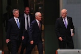 Malcolm Turnbull, Barnaby Joyce and Mathias Cormann follow Scott Morrison ahead of his delivery of the 2017 budget.