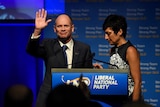 Queensland Premier Campbell Newman flanked by his wife Lisa