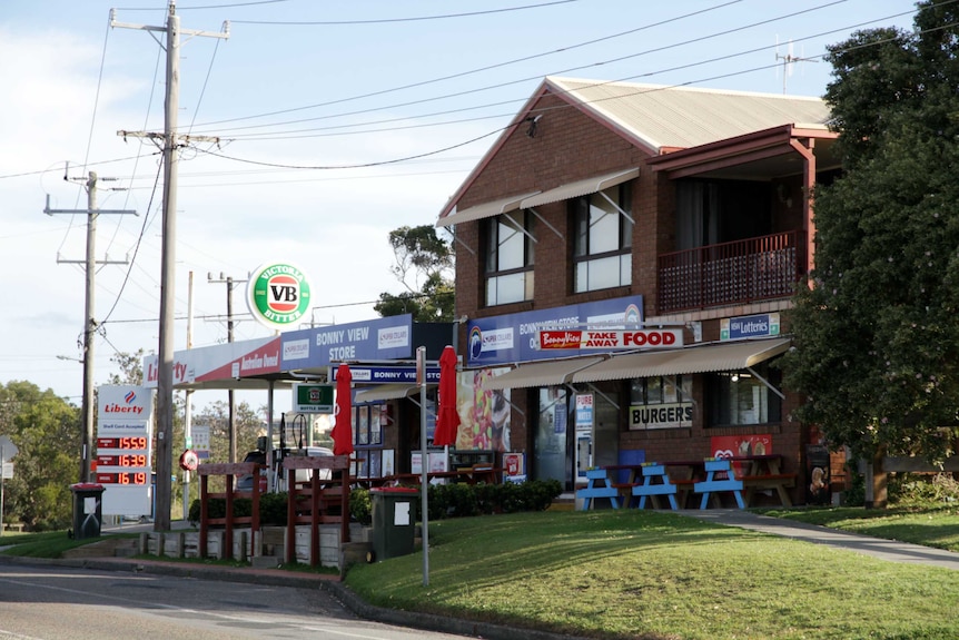 Photo of shops, including take-away restaurants and petrol station, in the NSW town of Bonny Hills.