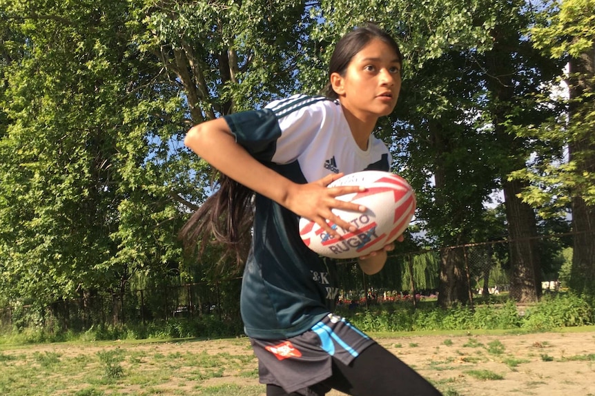 Beginner with rugby ball