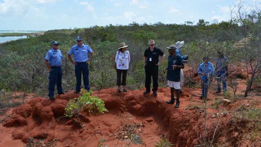 Broome Police and the Coroner's clerk inspect the site of a suspected Japanese pilot's grave near Broome.