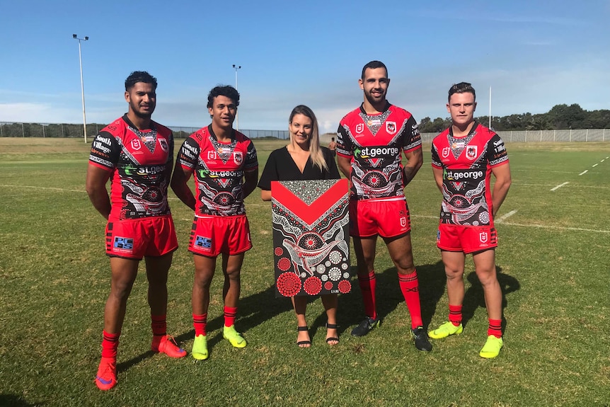 Lani Balzan and her 2019 Indigenous jersey design with Indigenous Dragons players