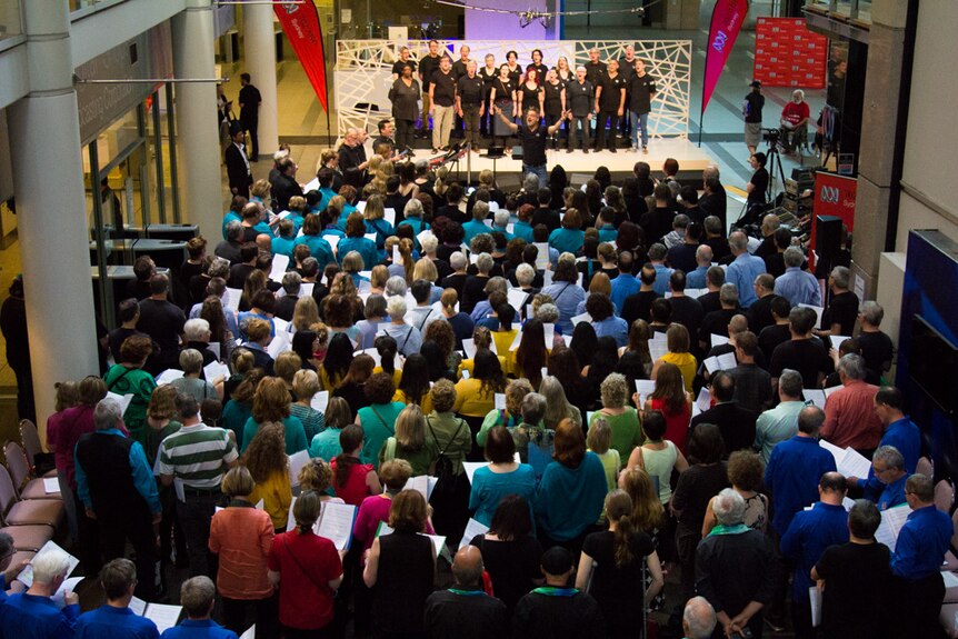 Singers from community choirs across the Sydney perform at 702's Sing Out Sydney event