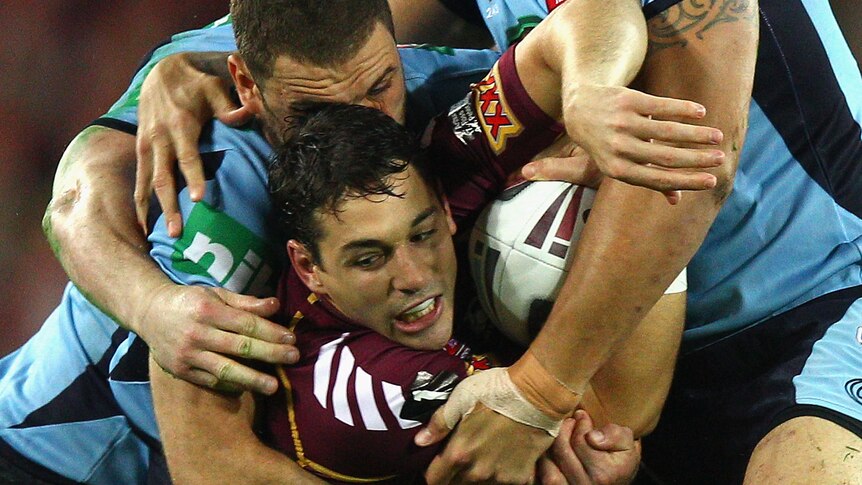 James Tamou of the Blues tackles Billy Slater of the Maroons during game two of the ARL State of Origin series