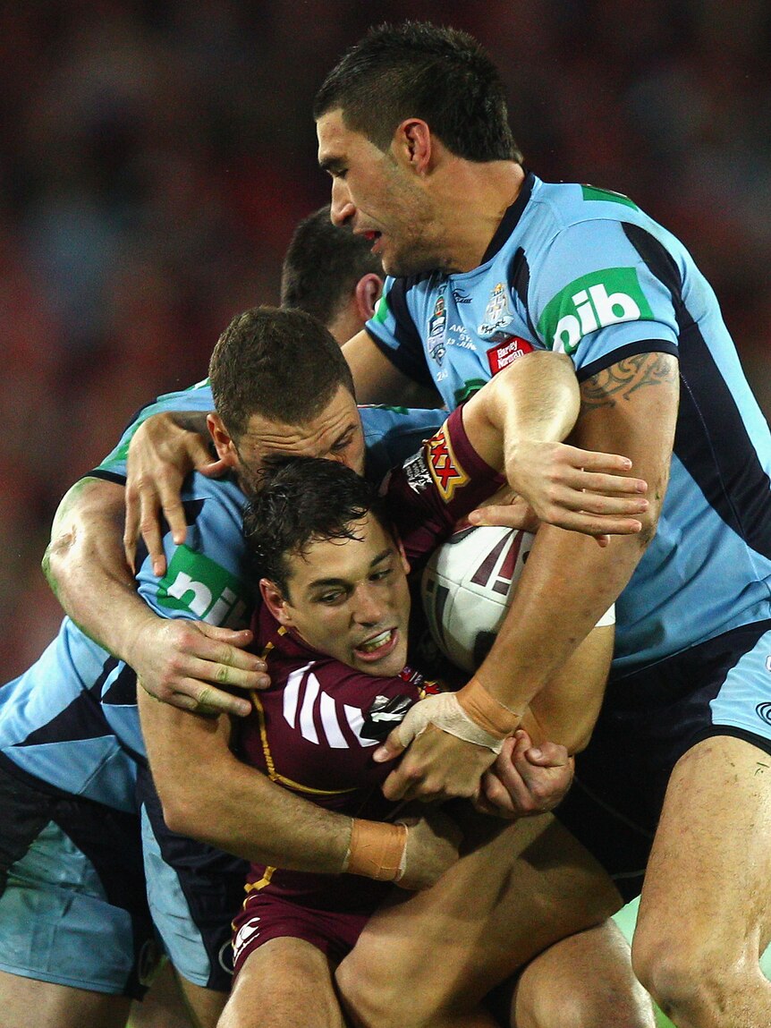 James Tamou of the Blues tackles Billy Slater of the Maroons during game two of the ARL State of Origin series