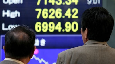 File photo: Nikkei Stocks Fall Below 7000 For The First Time Since 1982  (Getty Images:Kiyoshi Ota)