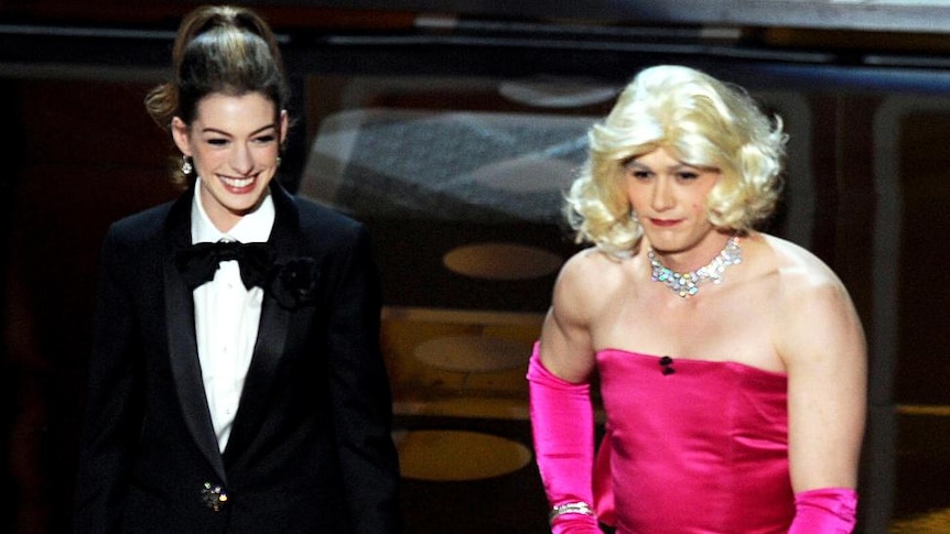 Hosts Anne Hathaway and James Franco perform onstage during the Oscars