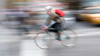 Blurred image of a cyclist (Thinkstock: Photos.com)