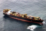 The Liberian-flagged 47,000 tonne container vessel Rena sits atop the Astrolabe Reef