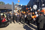 Mourners release balloons after Myuran Sukumaran's funeral