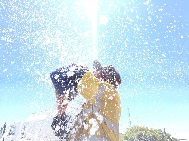 Labourer George McCay cools off during a 12-hour day on the southern-inland of Queensland.