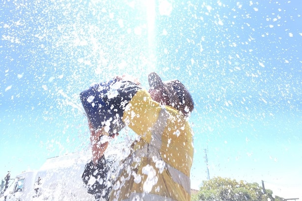 A man cools off during a 12-hour day on the southern-inland of Queensland.