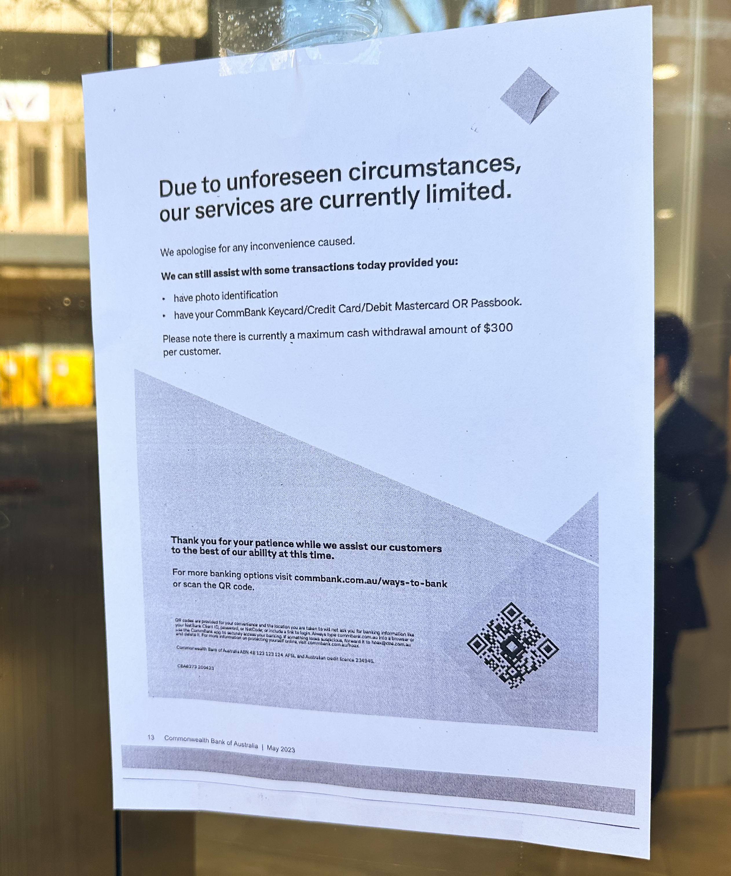 A sign on an A4 piece of paper which says "due to unforeseen circumstances, our services are currently limited".