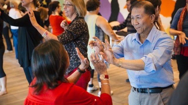 older people dancing at a dance class