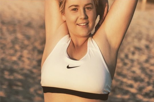 Cassie Sainsbury wears active wear in a photo on her instagram