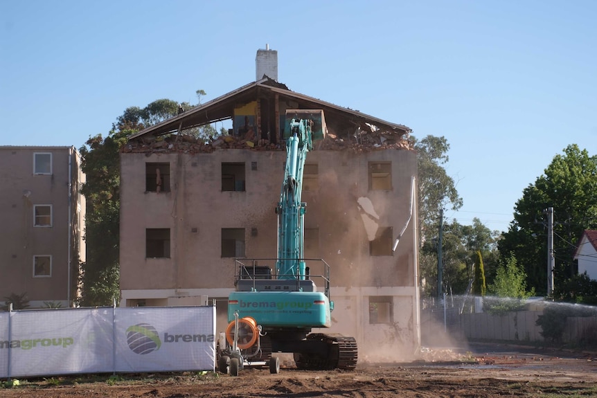 The Dickson flats are demolished.